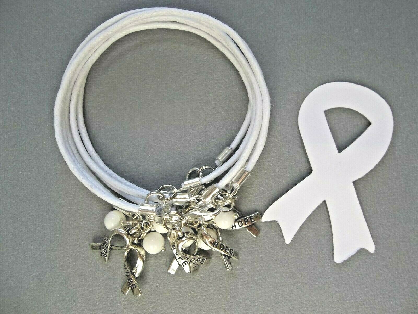 6 CT. LUNG CANCER AWARENESS WHITE ‘HOPE’ CHARM BRACELETS/WAXED COTTON CORD