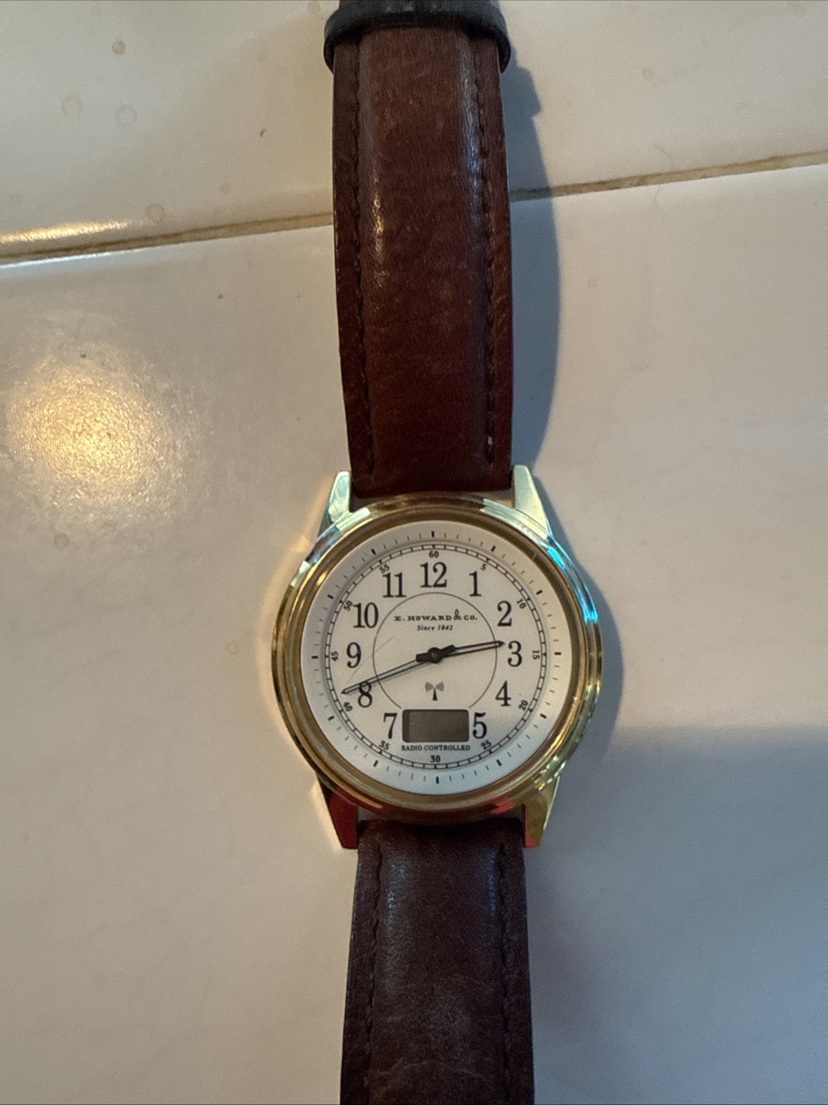 E Howard & Co Radio Controlled Atomic Watch Junghans Movement Gold Brown Leather