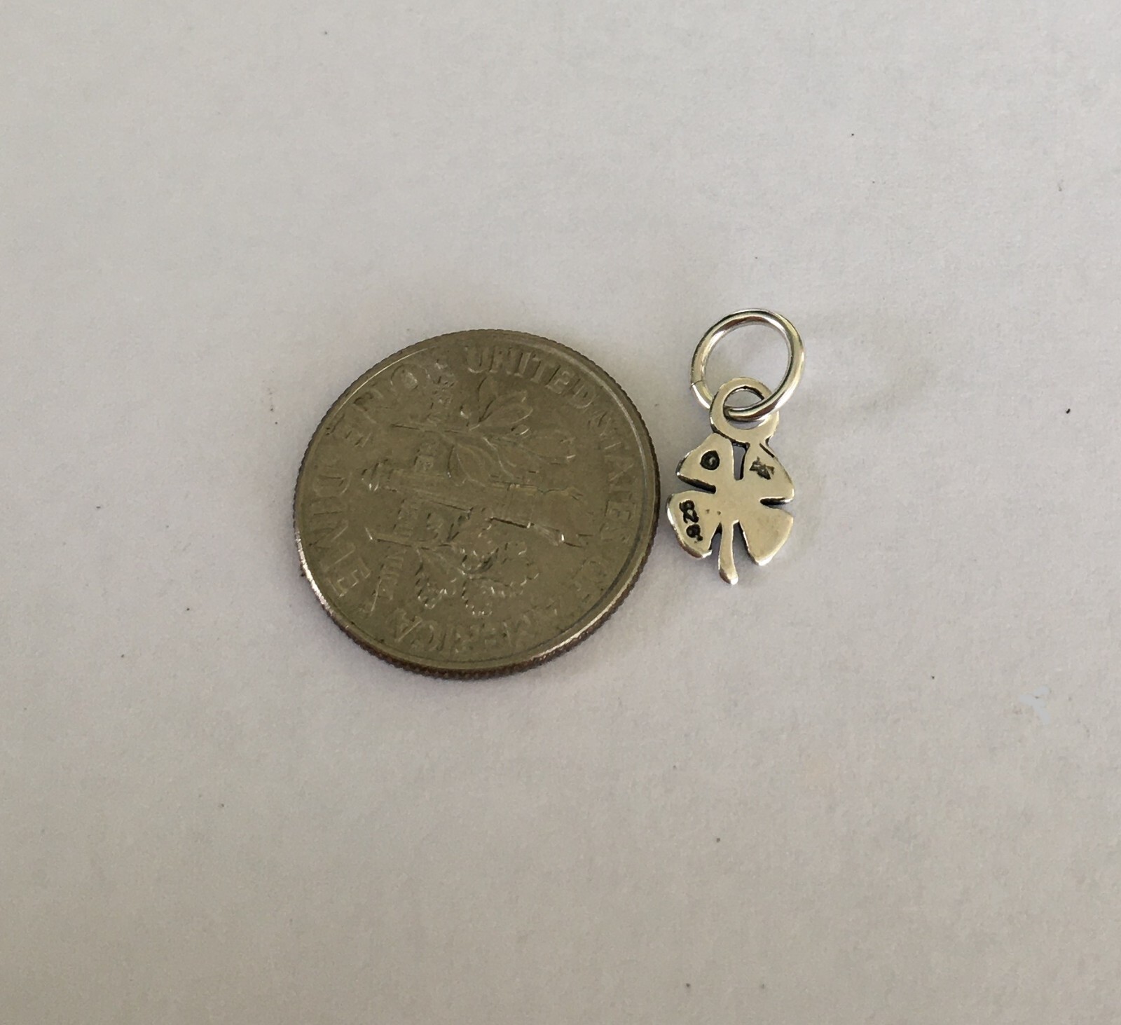 Very small Sterling Silver antiqued look lucky 4 leaf clover mini tiny charm.