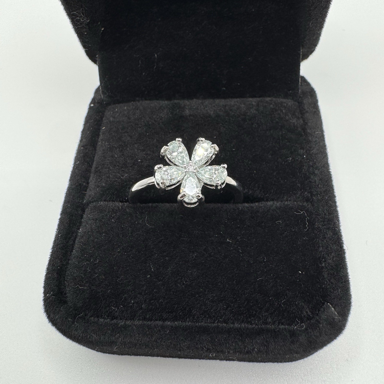 Silvertone Moissanite Floral Cluster Ring With Five Pair Shaped Petals