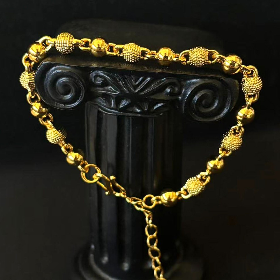 Golden Gold-tone Ball Bracelet Chain marked ‘ 999 ‘, 7-8.5 in adjustable