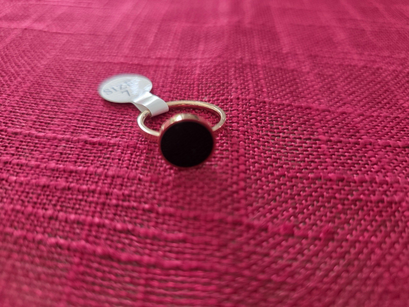Women’s gold and black ring size 7