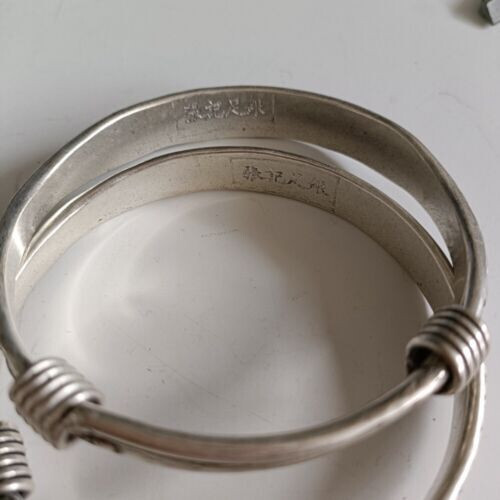 A Pair Old Chinese tibet silver handcarved Auspicious patterns Bracelets