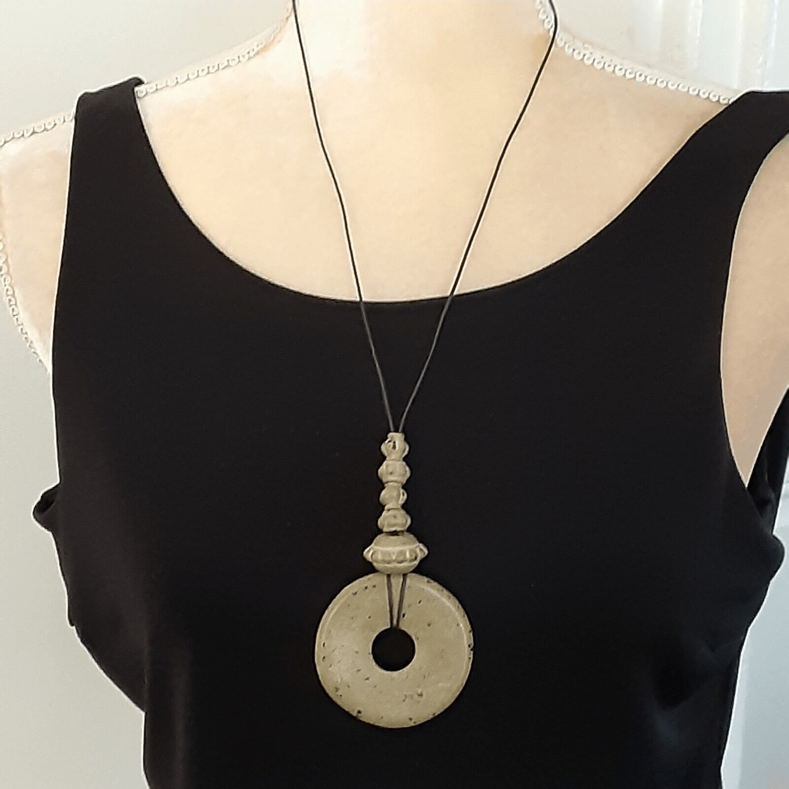 Asian inspired faux stone pendant black cord necklace 28″