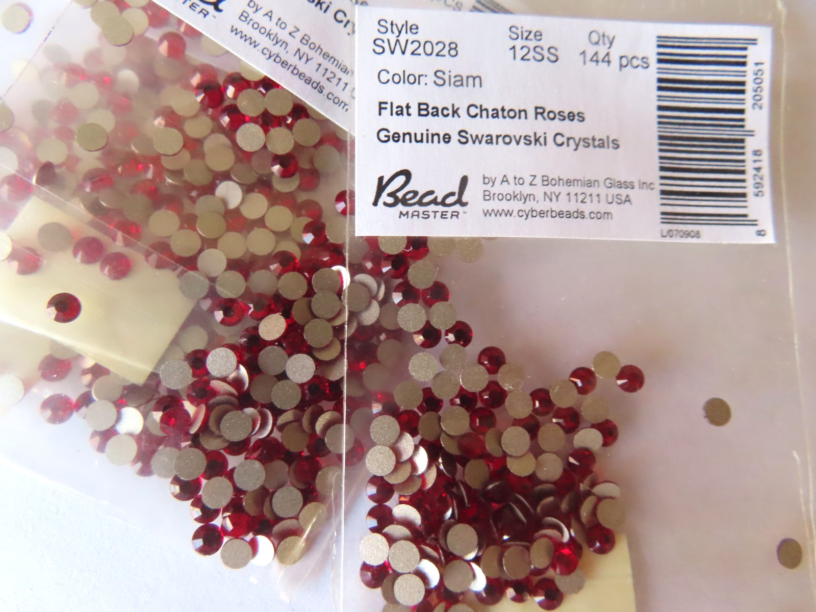 144 Swarovski Flatbacks 12ss Siam/foiled. #2028