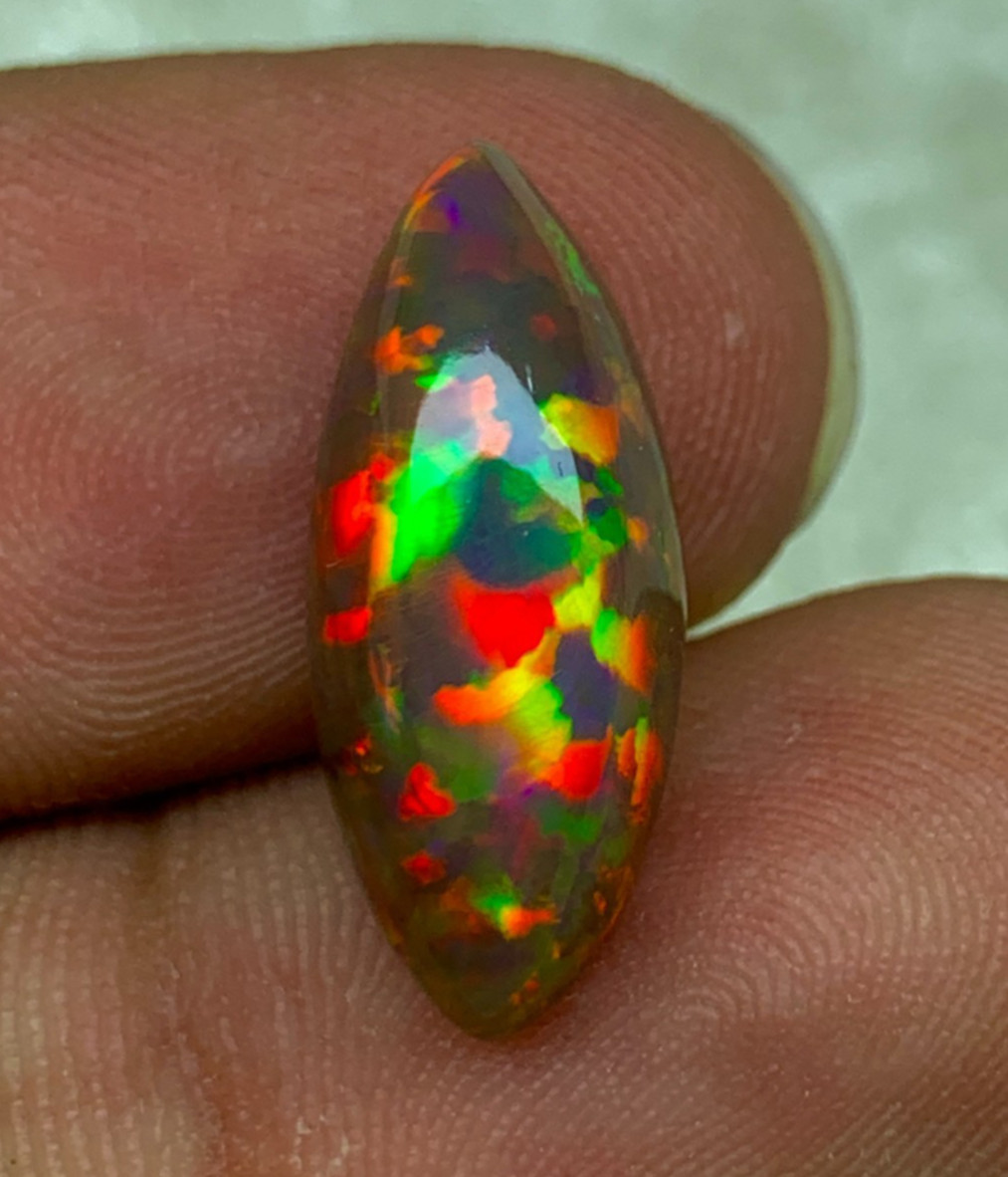 Shewa Chocolate Ethiopian Opal Gemstone 4.55 Carat Multi-Fire Marquise Cabochon