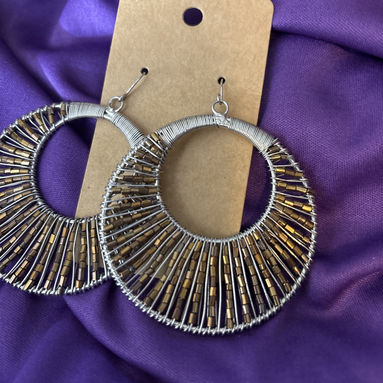 large silver wire wrapped hoop earrings w/ pewter beads.