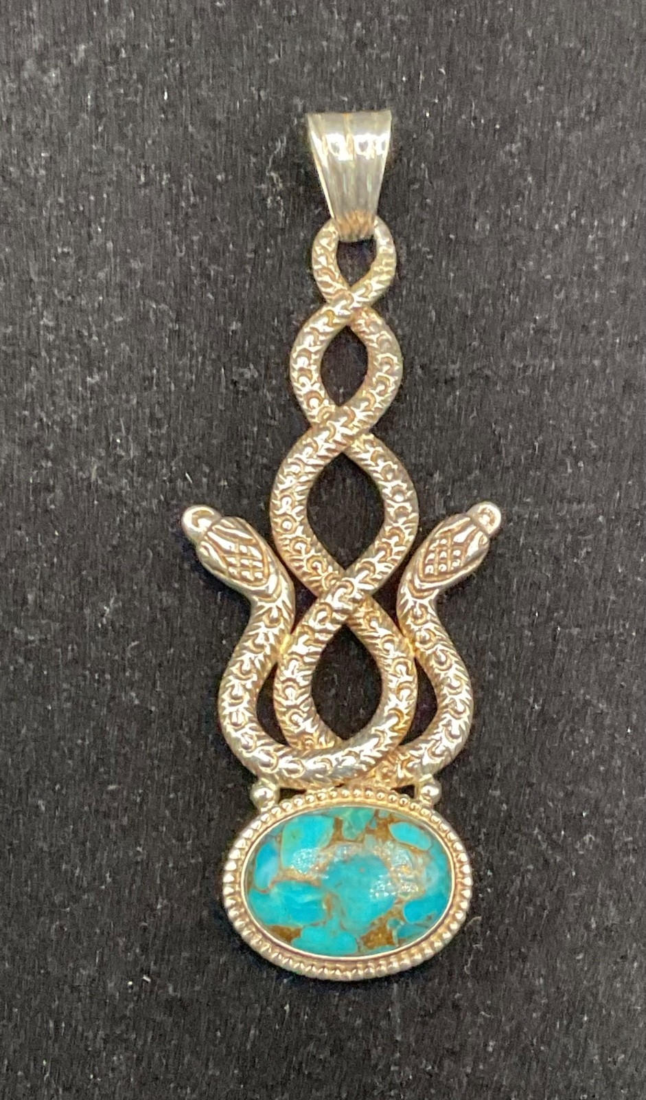 sterling silver vintage intertwined serpentine ( double snake) turquoise pendant