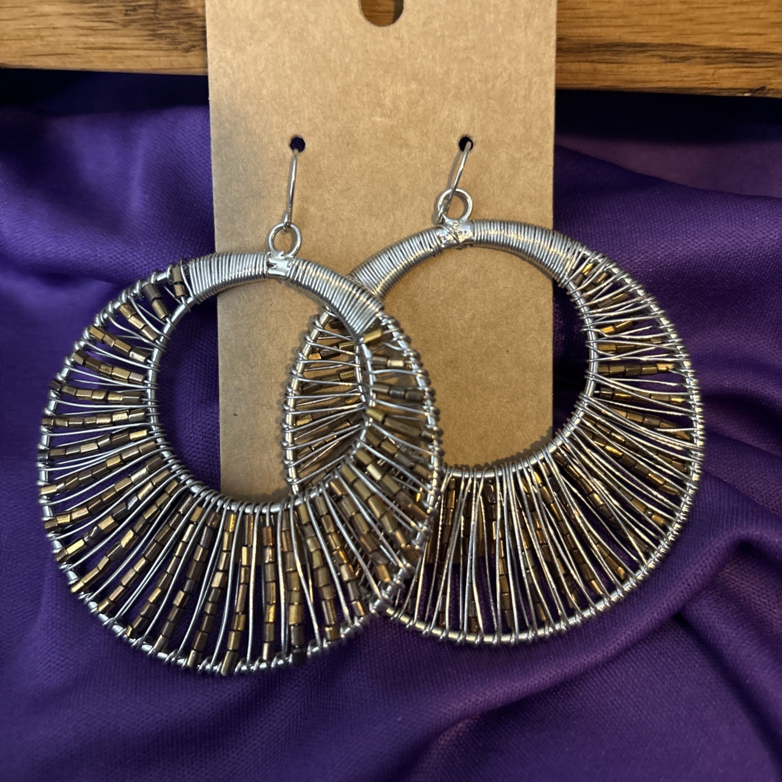large silver wire wrapped hoop earrings w/ pewter beads.