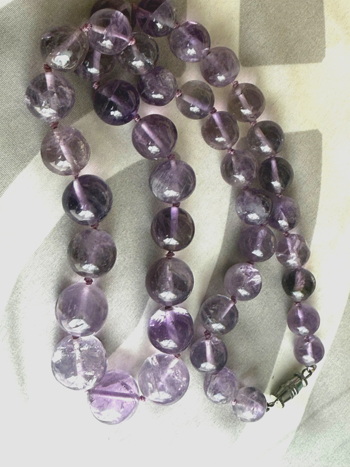Hand polished amethyst 41 beaded graduated knotted 21.5” necklace