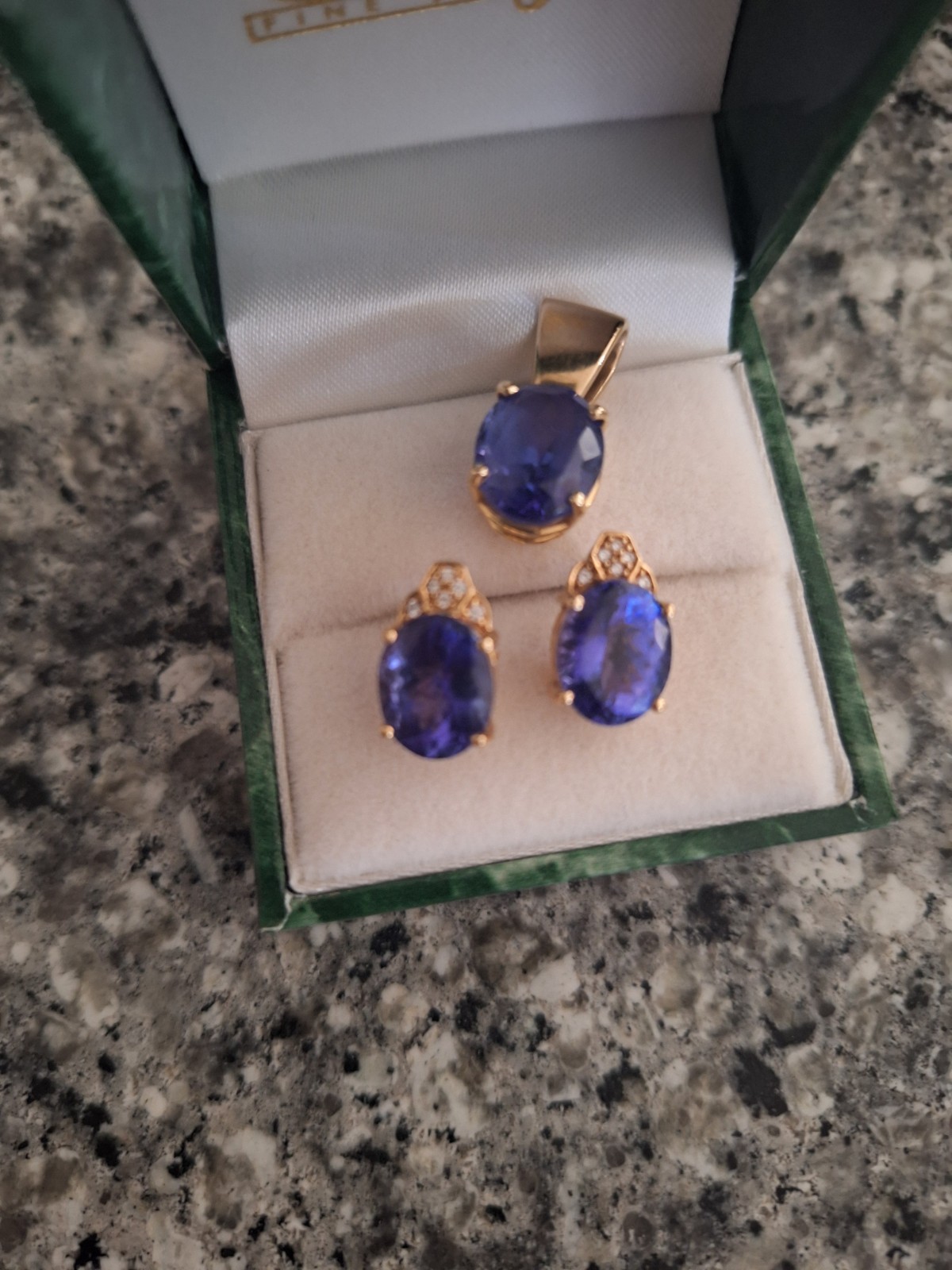 Tanzanite and diamond Stud Earrings 18kt yellow gold
