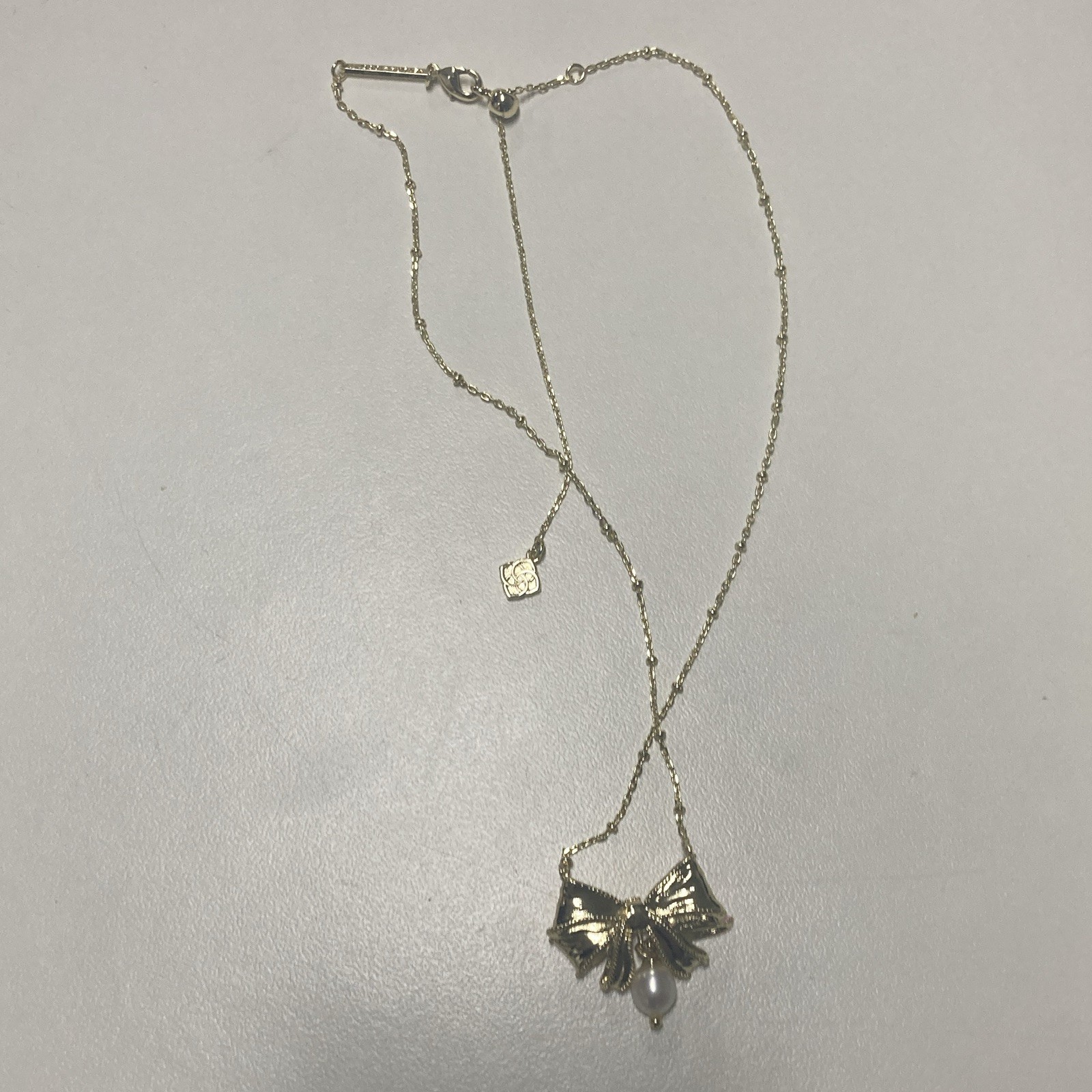 Silver Metal Bow Pendant Necklace Adjustable Cable Chain Lobster Closure