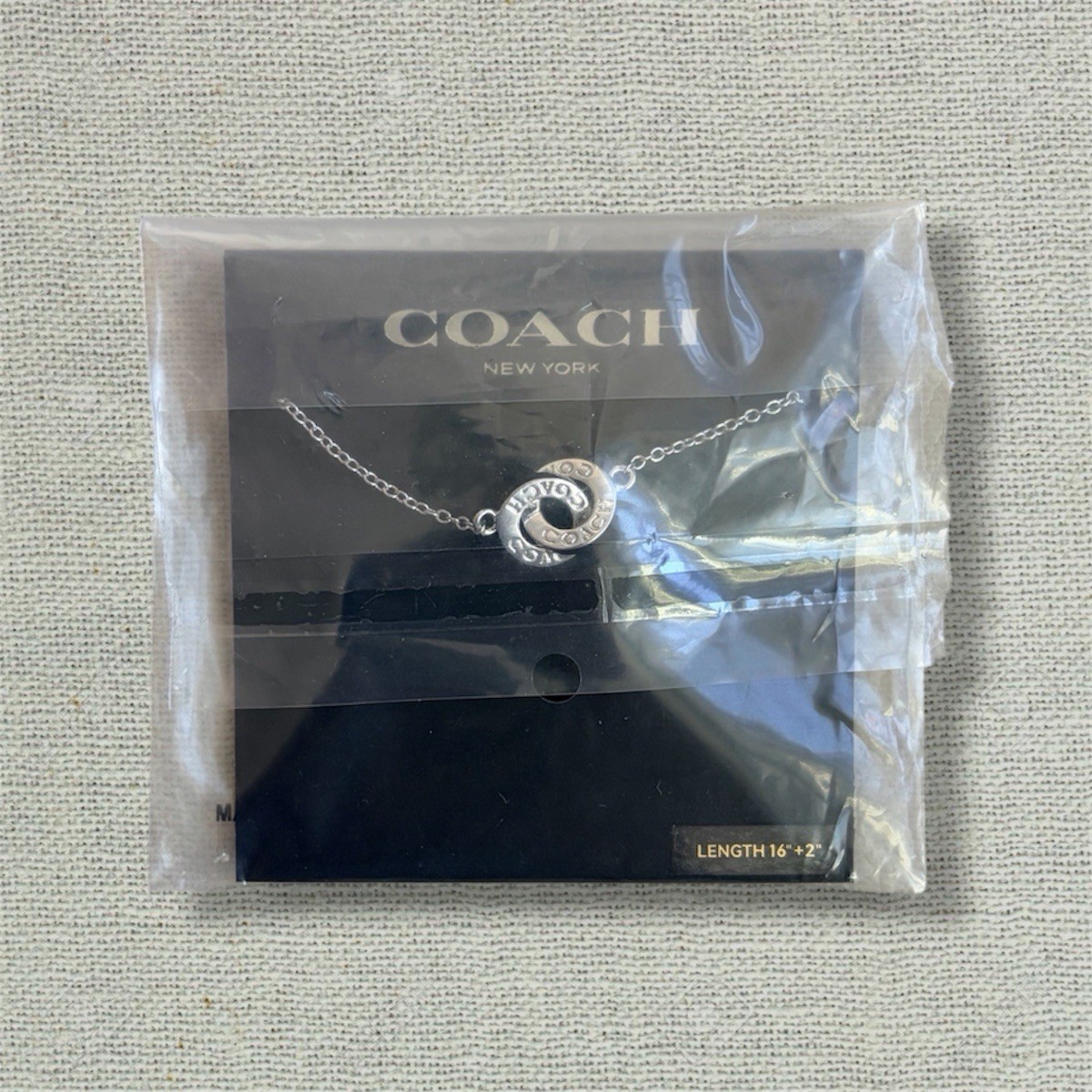 Authentic Coach Silver Interlocking Ring Necklace 16″+2″ Chain New w/ Card