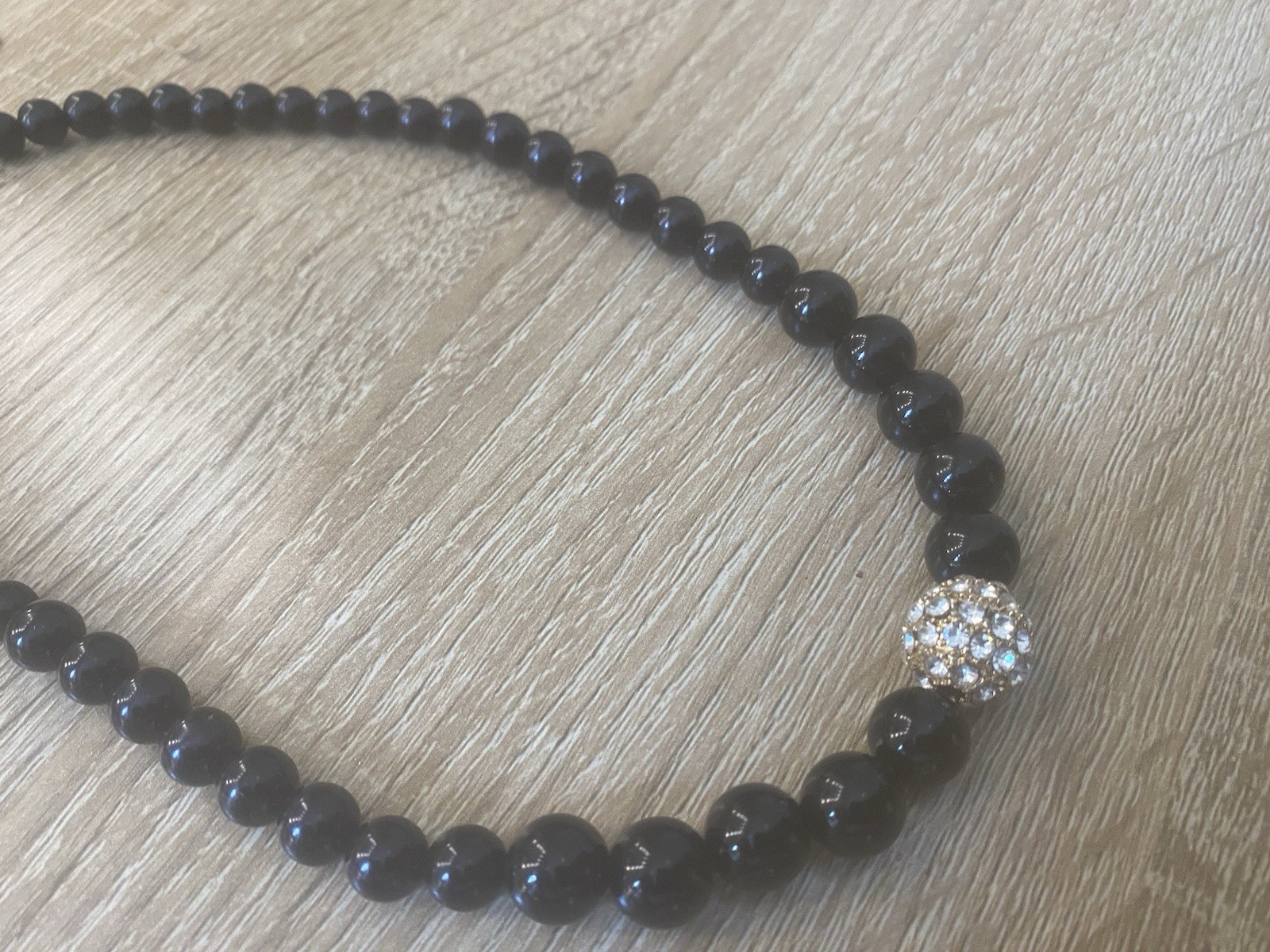 Classic Glossy Black Beaded Necklace Sparkling Rhinestone Accent Gold Tone Clasp