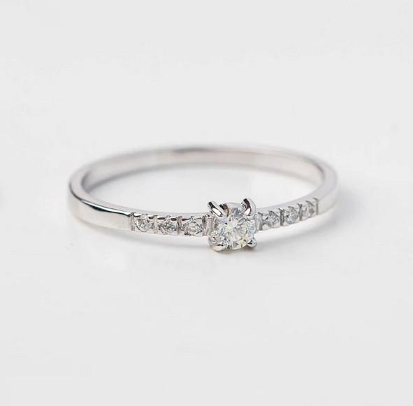 Bright Pave Set Round Cut Moissanite Women’s Wedding Band In Pure 10K White Gold