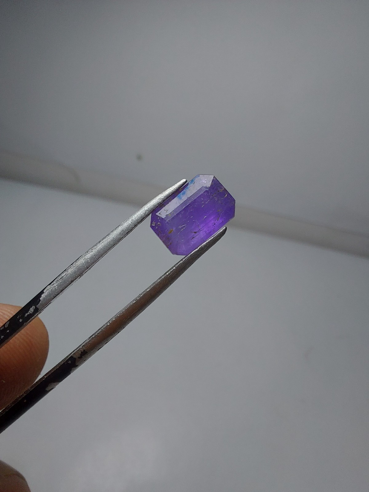 1.35- carat fluorescent Tenebrecent hackmanite cut from Badakhshan Afghanistan