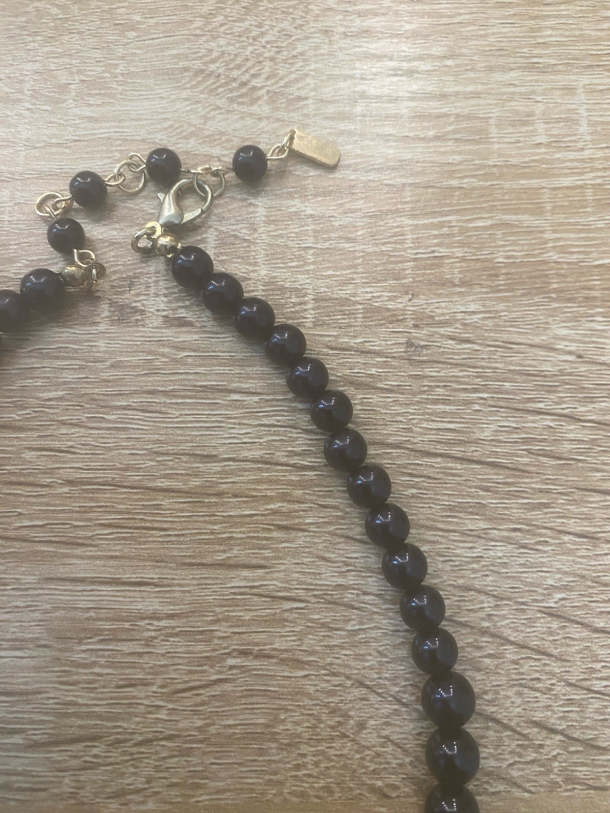 Classic Glossy Black Beaded Necklace Sparkling Rhinestone Accent Gold Tone Clasp