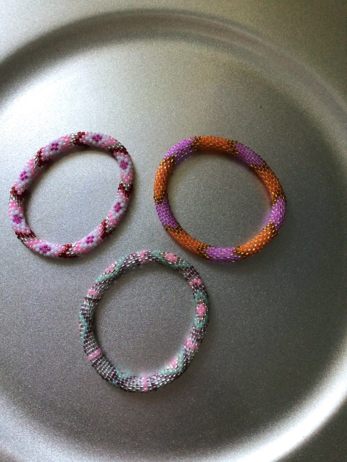 PINK COLORED 7″ ROLL ON SASHKA BRACELETS, 12 PCS