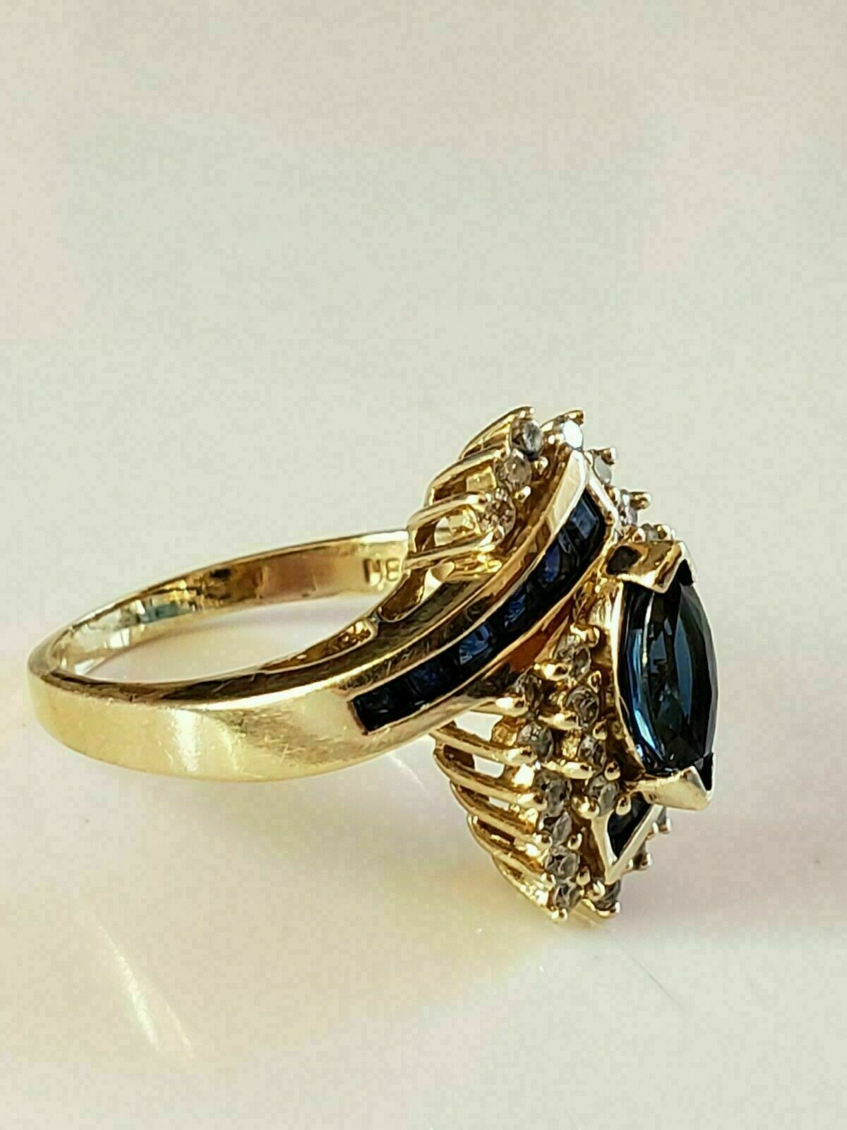 2.5Ct Marquise Cut Lab-Created Sapphire Engagement Ring 14K Yellow Gold Finish