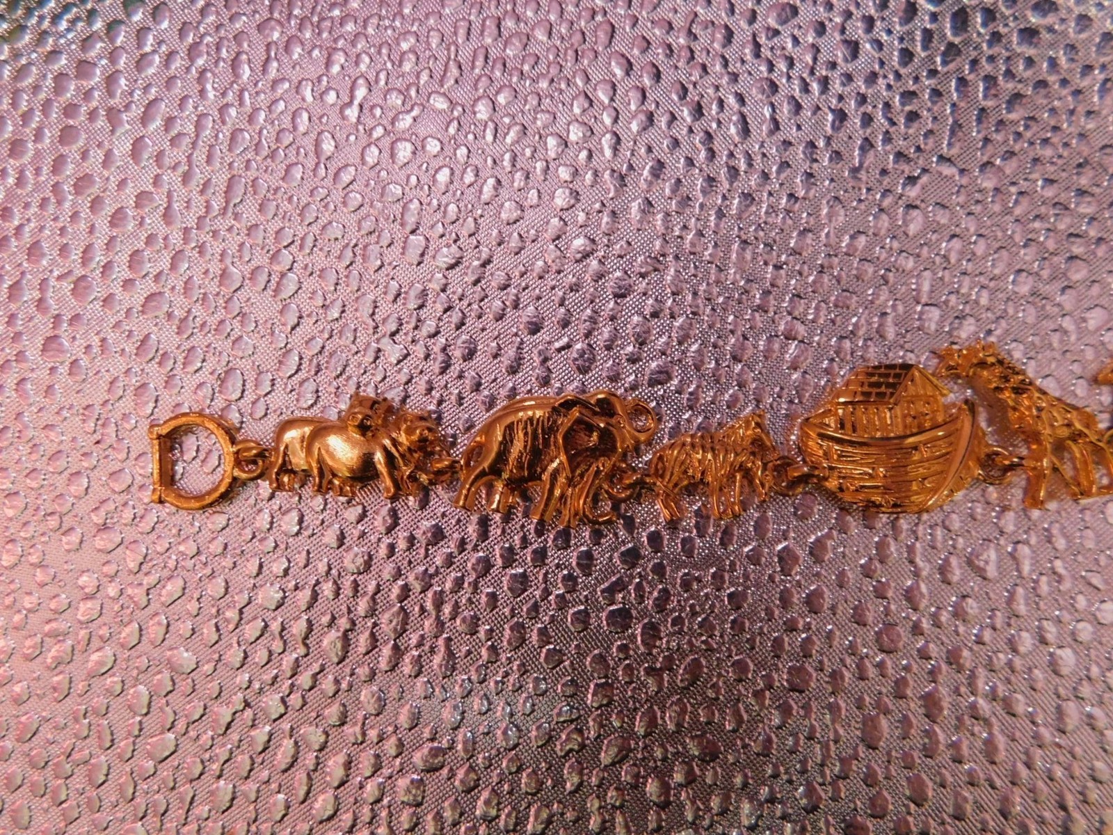 Noahs Ark Gold-Tone Charm Bracelet With Animal Design & Clasp Closure