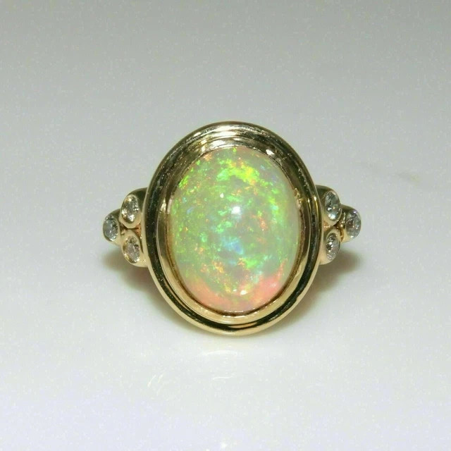 Fire Opal 2.50Ct Oval Cut Diamond Bezel Engagement Ring 14K Yellow Gold Finish