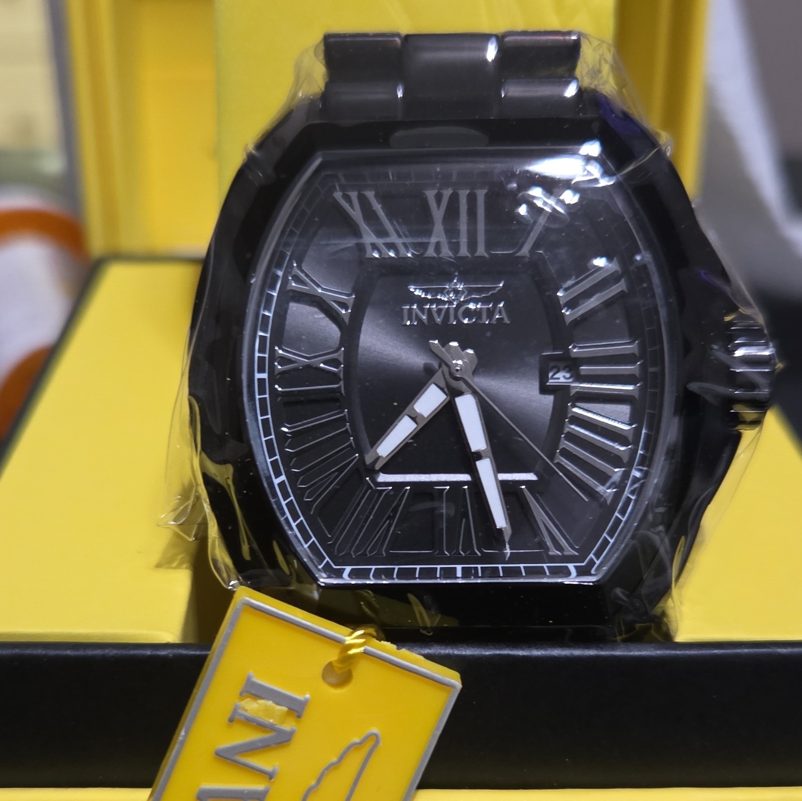 Invicta Men’s Quartz Black Dial Roman Numerals Date Tonneau Watch w/ Box