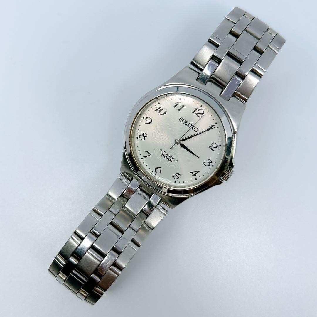 SEIKO men’s watch with guilloché dial and Arabic numerals. Brand new batter