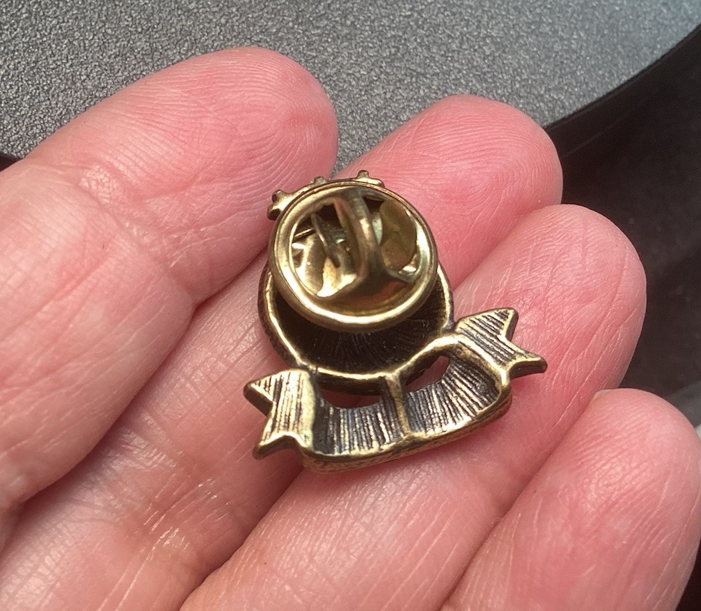Black And Gold Tone 2000 World Lapel Hat Pin With Stars