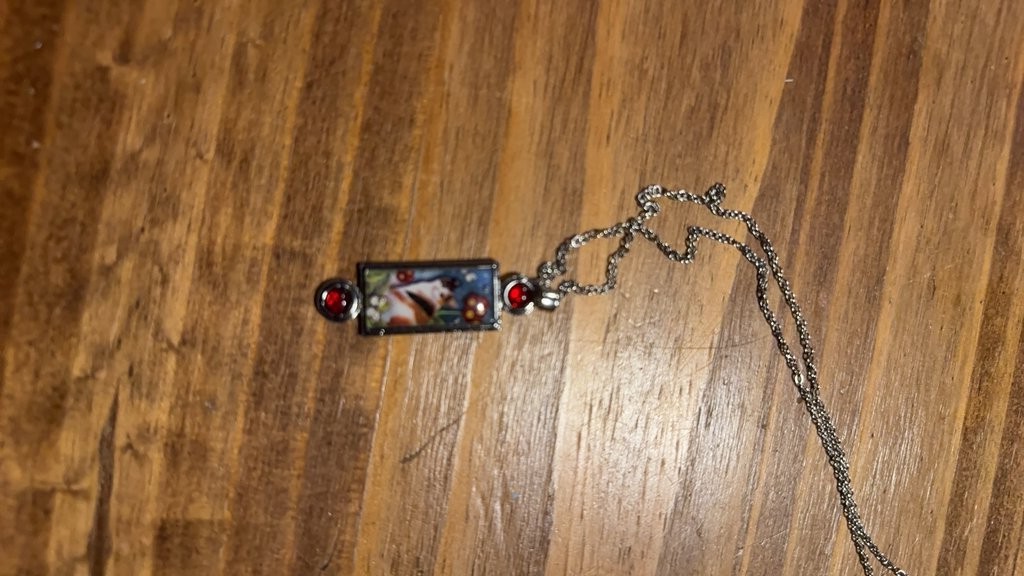 Handcrafted Cat Portrait Pendant Necklace with Red Gem Accents