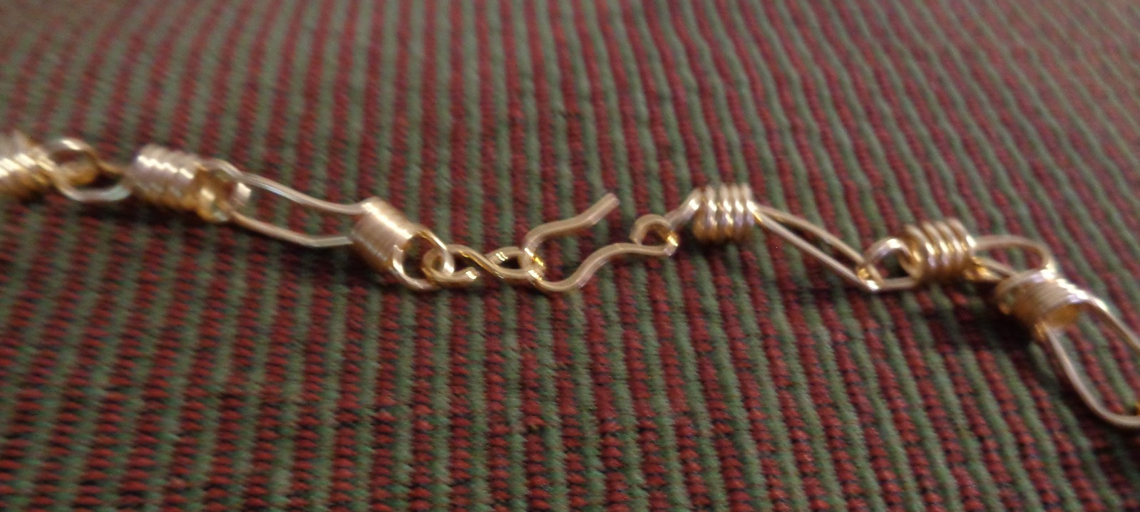 Artisan crafted,18”red rutilated quartz strand, hand knotted on silk, featuring