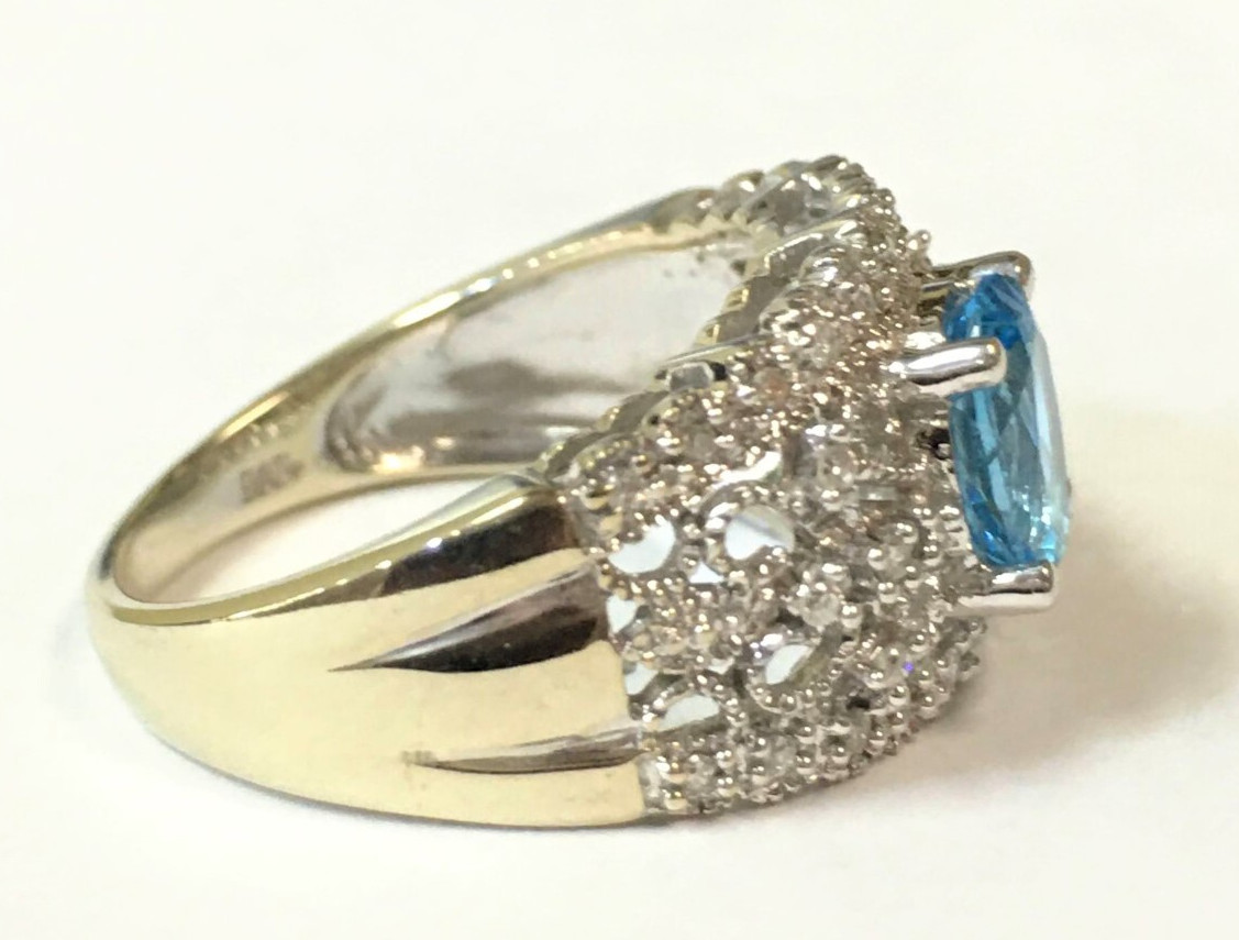 14k White Gold Ring with Blue Topaz and 0.16ctw Diamonds (Size 6.75) 5.3 gram