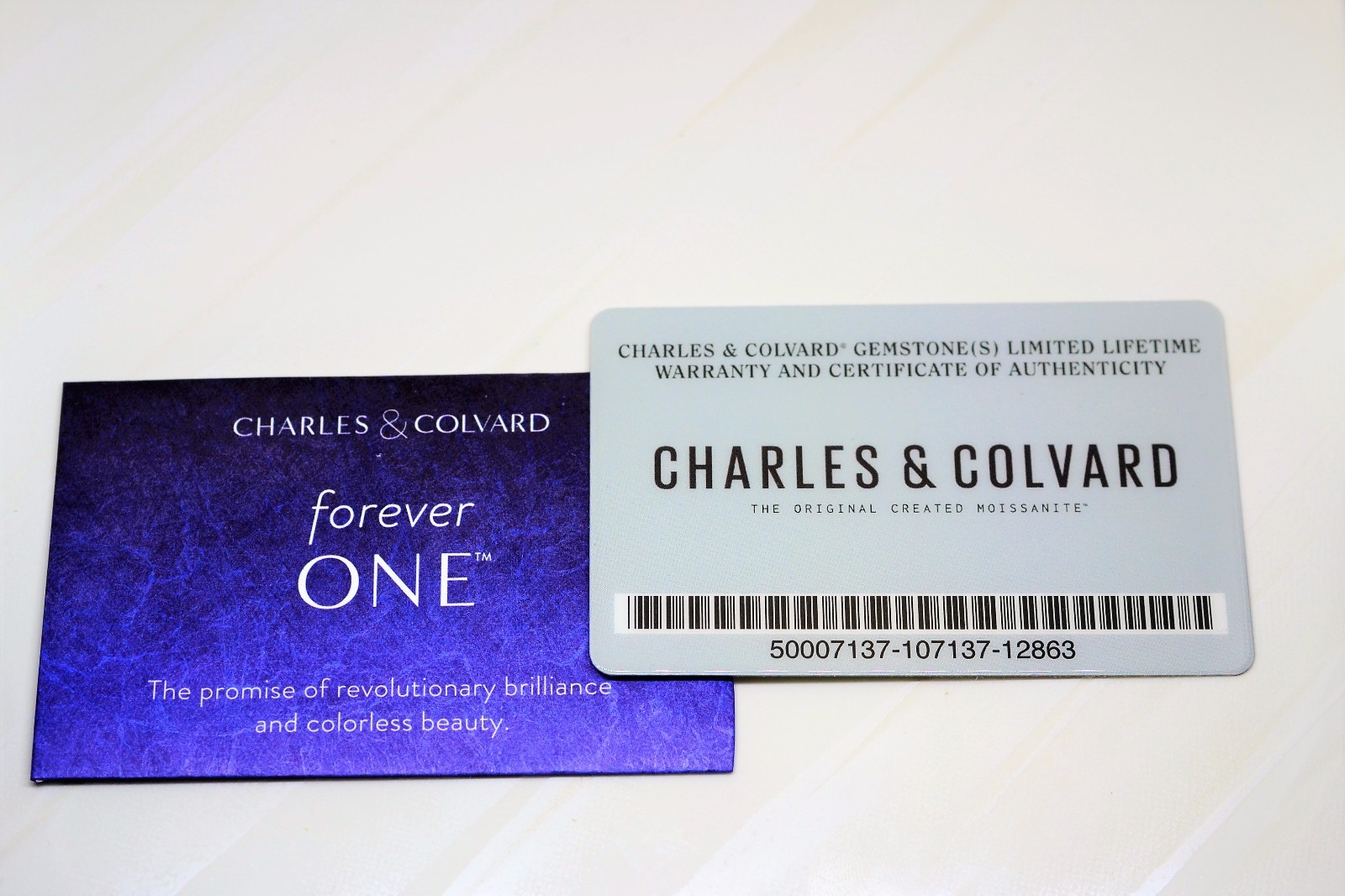 Charles and Colvard Forever One DEF Moissanite 2.5mm Round With Certificate