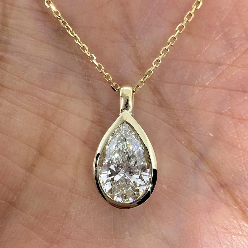 2Ct Pear Cut Moissanite Tear Drop Bezel Solitaire Pendant 14K Yellow Gold Plated