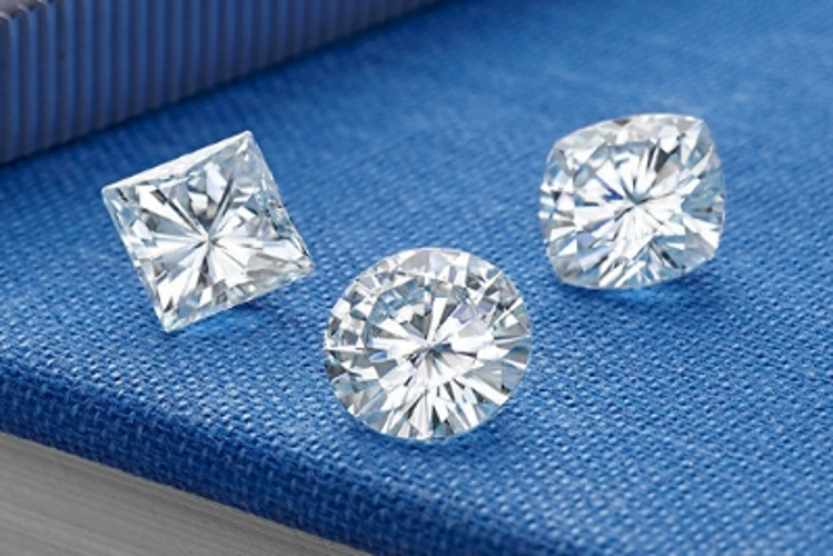 Charles and Colvard 6.5mm Round Forever One DEF Hearts & Arrows Moissanite wCard