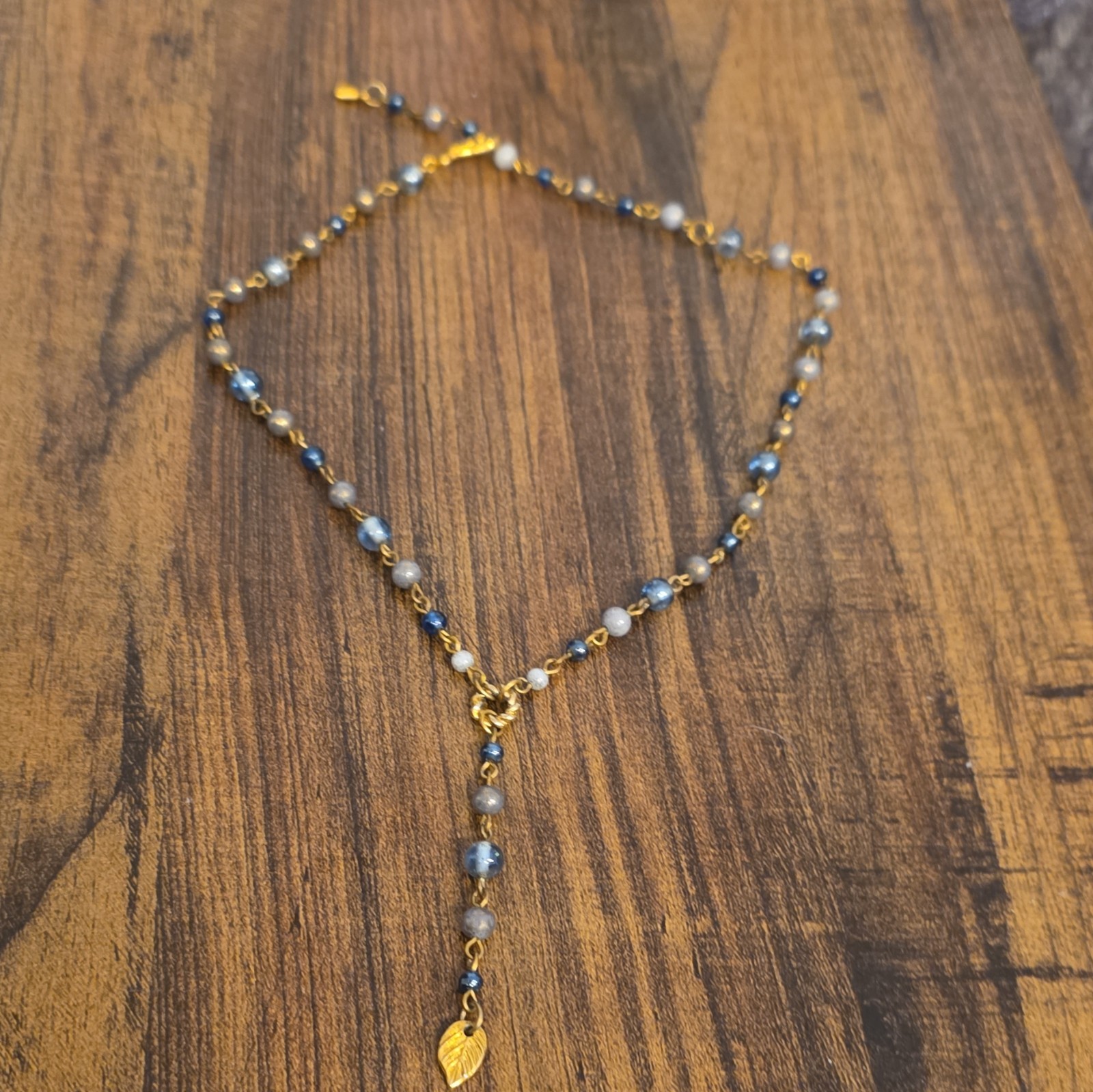 Gold Tone Adjustable Beaded Lariat Necklace Gray/Blue Stones Leaf Charm