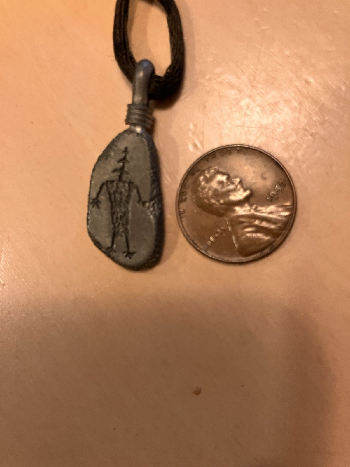 Petroglyph Replica Pewter Pendants With Black Cording