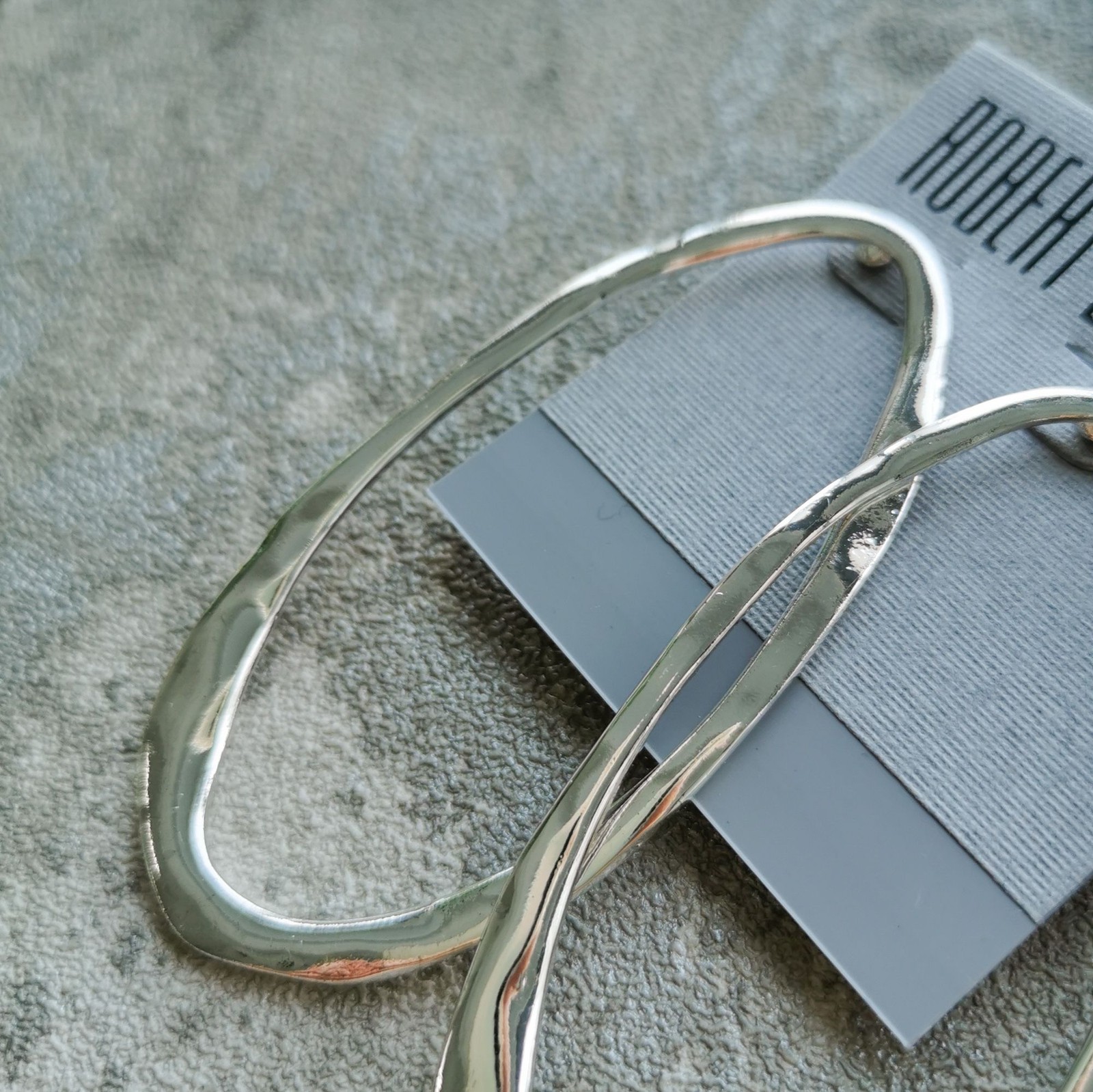 Robert Lee Morris Silver Plated Elongated Oval Hoop Earrings Modern Chic