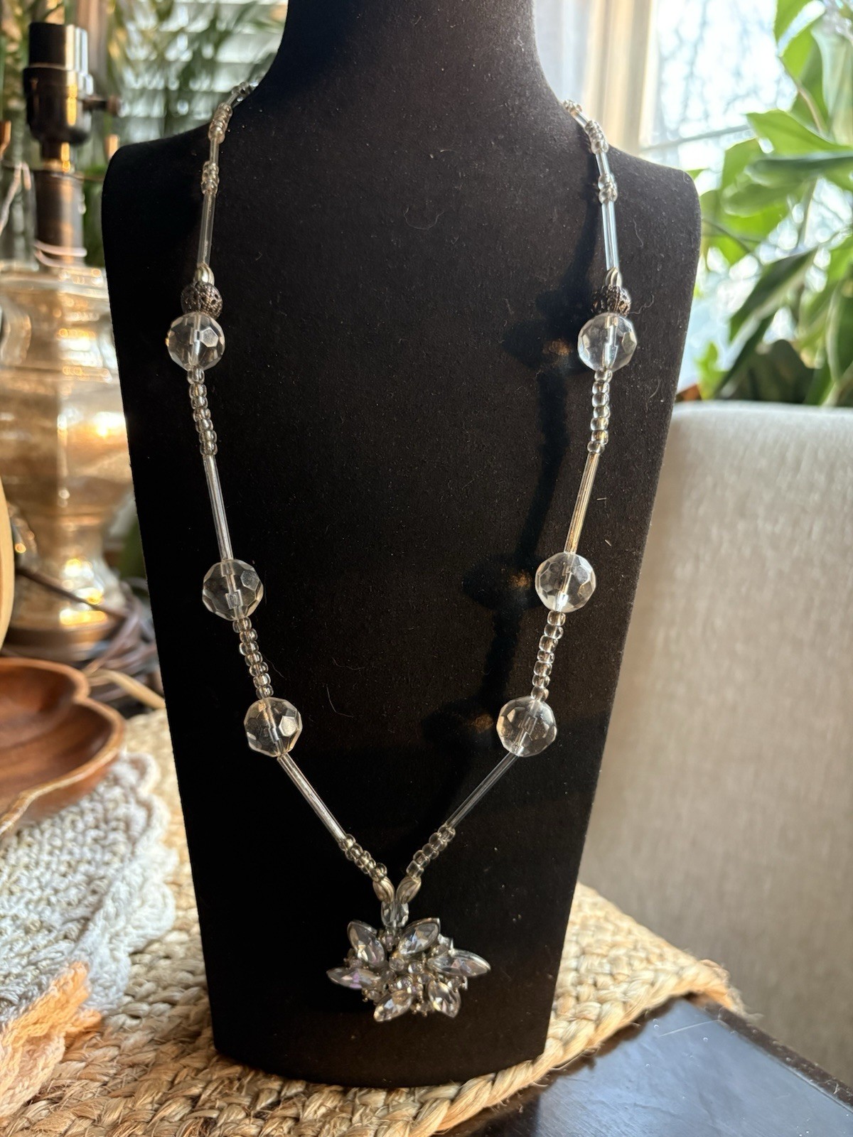 Elegant Art Deco style beaded necklace with rhinestone flower pendant