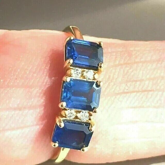 3.CT Three Stone Wedding Ring Lab Created Sapphire 14K Yellow Gold Plated Silver