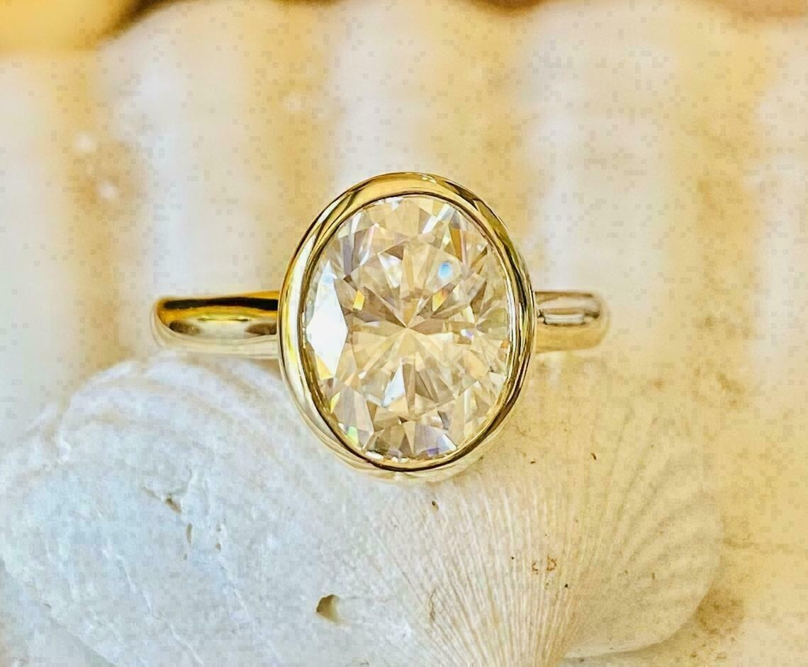 2 CTW Oval Cut VVS1 Moissanite Bezel Set Engagement Ring 14K Yellow Gold Plated