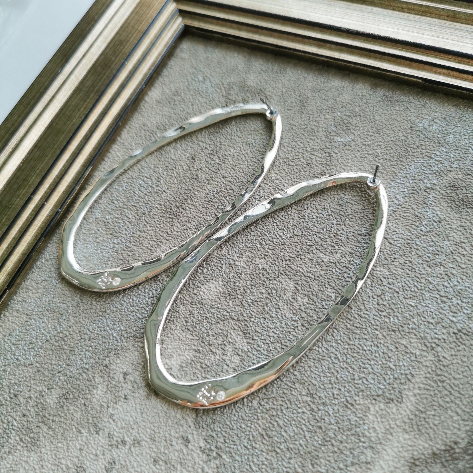 Robert Lee Morris Silver Plated Elongated Oval Hoop Earrings Modern Chic