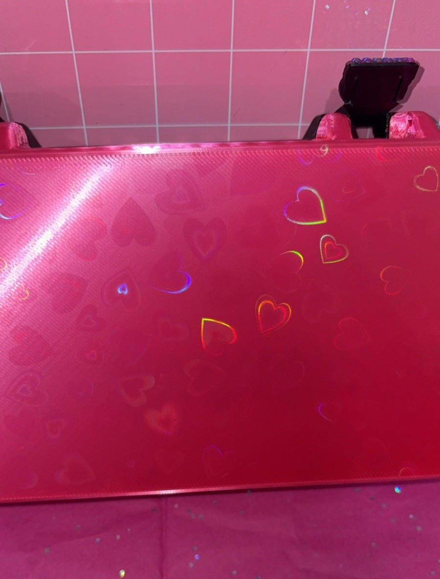 Pink Hearts Leopard Print Lid Plastic Lined holds 7 10ml vials and 10 3mL vials.