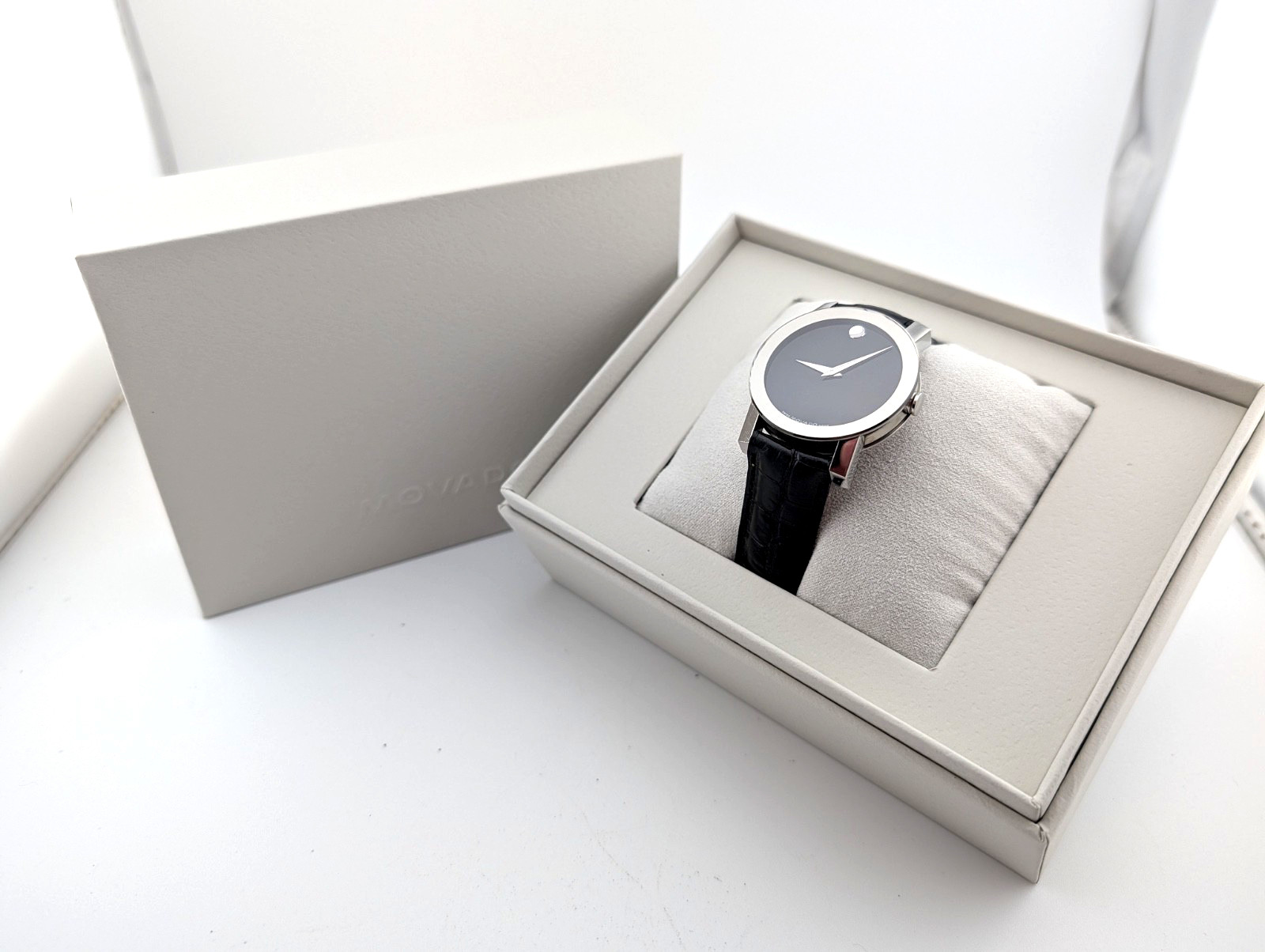 Movado Men’s (Unisex?) Sapphire Mirror Bezel/Black Dial; Model #84.G1.2896 ~Cool
