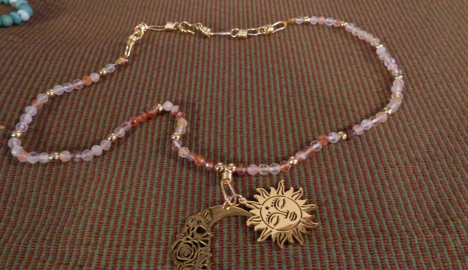 Artisan crafted,18”red rutilated quartz strand, hand knotted on silk, featuring