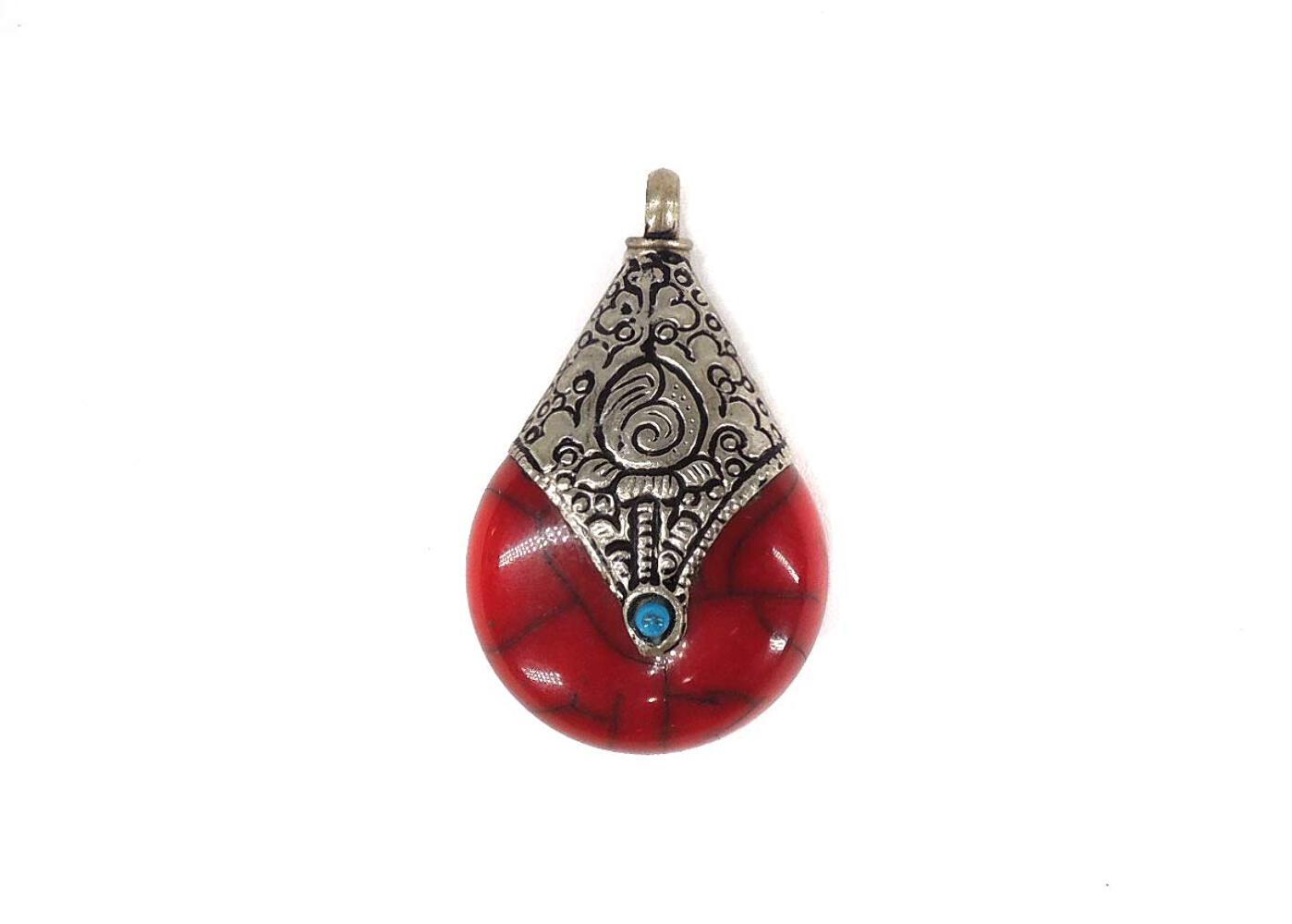 Tibetan Red Crackle Silver Repoussé Pendant