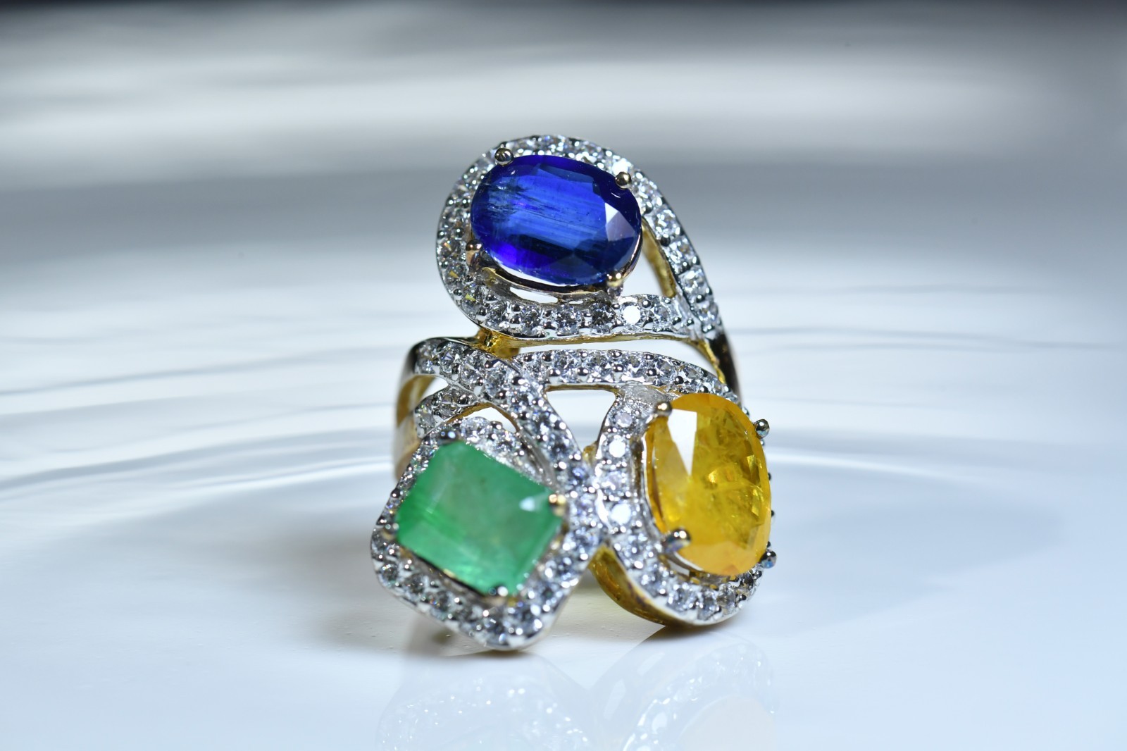 3 Stone Multi Gemstone Ring Emerald, Kyanite, Yellow, Sapphire surrounded CZ