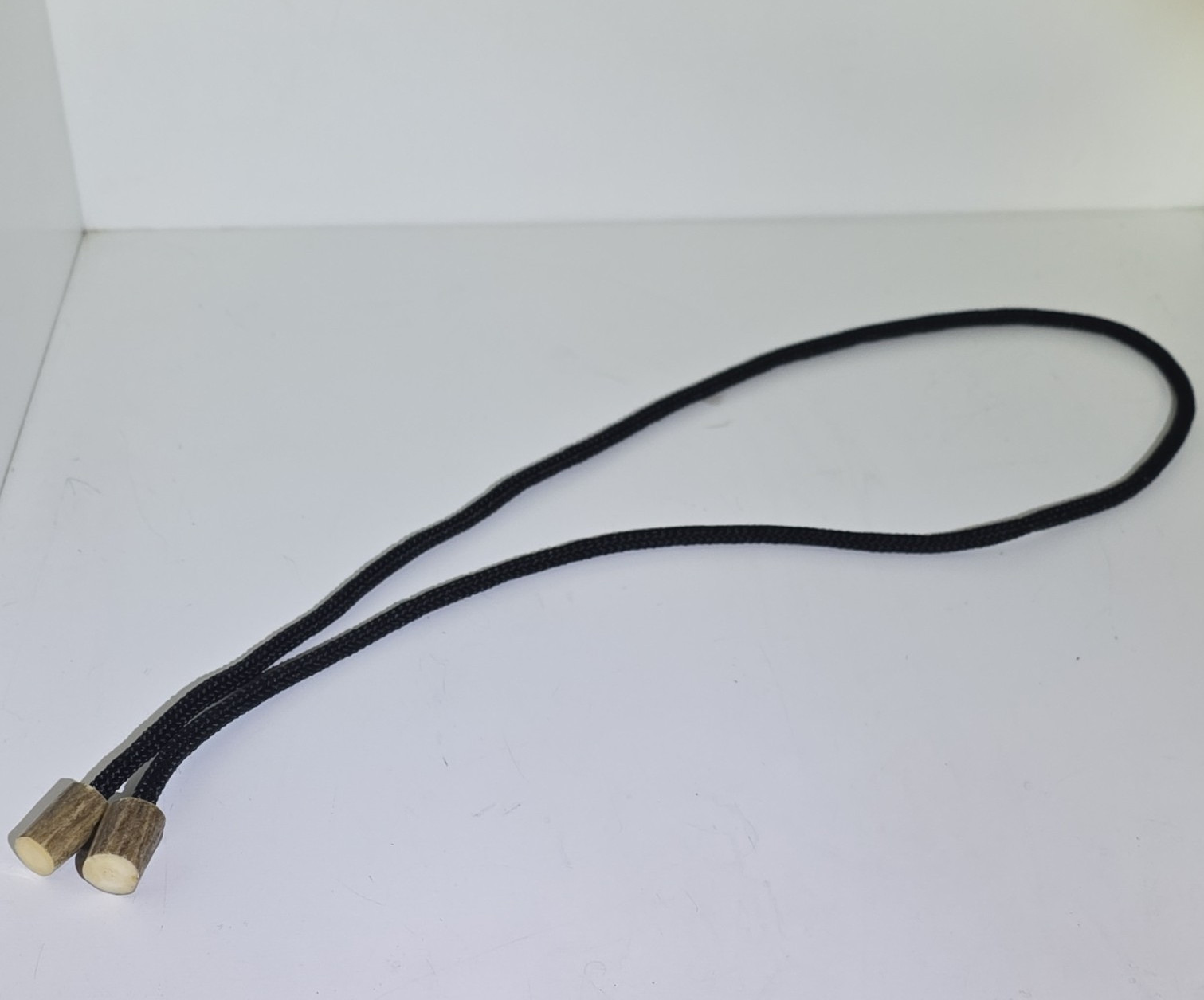 Men’s Black Cord Bolo Tie, No Stone, “Montana” Elk Horn End Tips