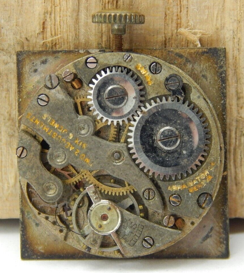 Vintage Abra 6 jewel 2 Adjustment 8/0s watch movement with dial hands and crown