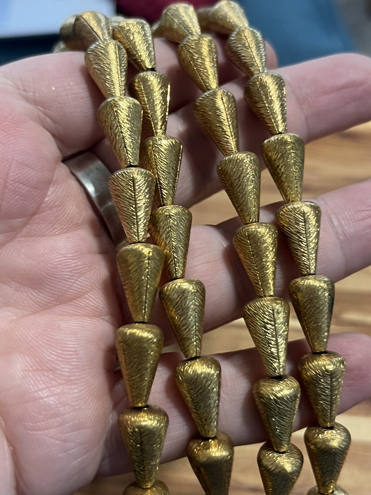 Vintage Mid Century Gold Tone Ribbed Teardrop Metal Bead Strand 12in