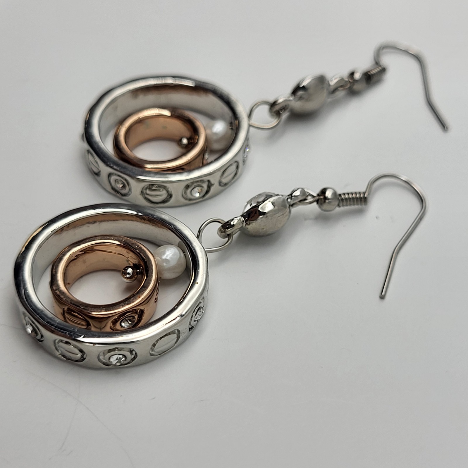 Fun Mixed metals articulated earrings screw print pierced dangles